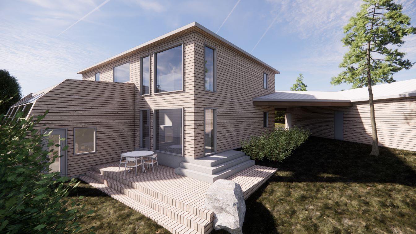 Façade arrière en coin avec serre
